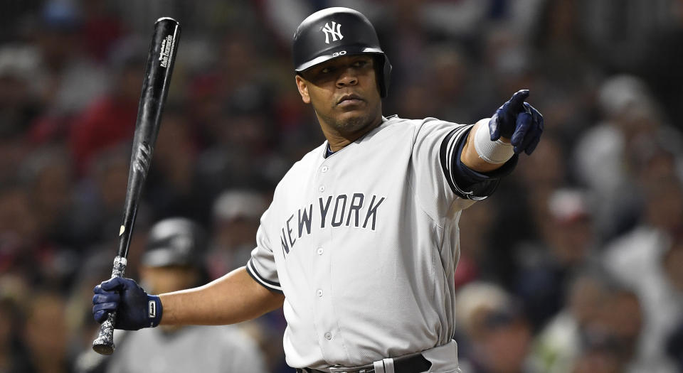 MINNEAPOLIS, MINNESOTA - OCTOBER 07: Edwin Encarnacion #30 of the New York Yankees reacts to a check swing in game three of the American League Division Series against the Minnesota Twins at Target Field on October 07, 2019 in Minneapolis, Minnesota. (Photo by Hannah Foslien/Getty Images)