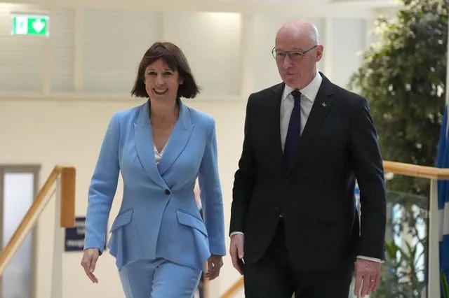 Rachel Reeves and John Swinney walking side-by-side