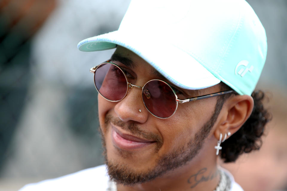 SPA, BELGIUM - AUGUST 29: Lewis Hamilton of Great Britain and Mercedes GP smiles in the Paddock during previews ahead of the F1 Grand Prix of Belgium at Circuit de Spa-Francorchamps on August 29, 2019 in Spa, Belgium. (Photo by Charles Coates/Getty Images)