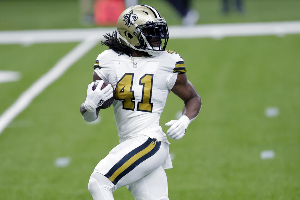 New Orleans Saints running back Alvin Kamara (41) breaks free on a 40 yard touchdown carry in the first half of an NFL football game against the Minnesota Vikings in New Orleans, Friday, Dec. 25, 2020. (AP Photo/Brett Duke)