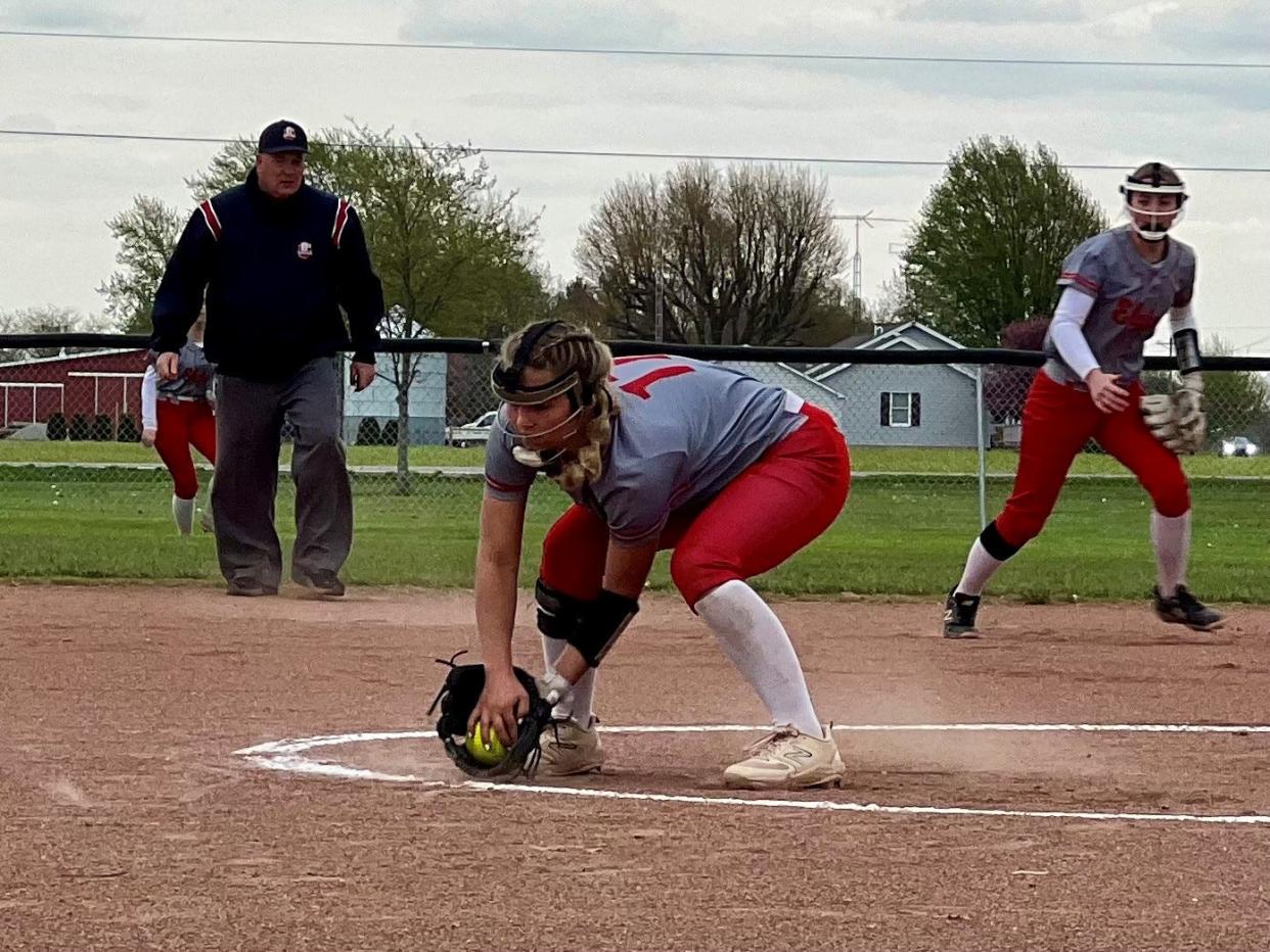 Elgin's Gracie Isler fields a ball at pitcher during a home softball game with Perry last week.