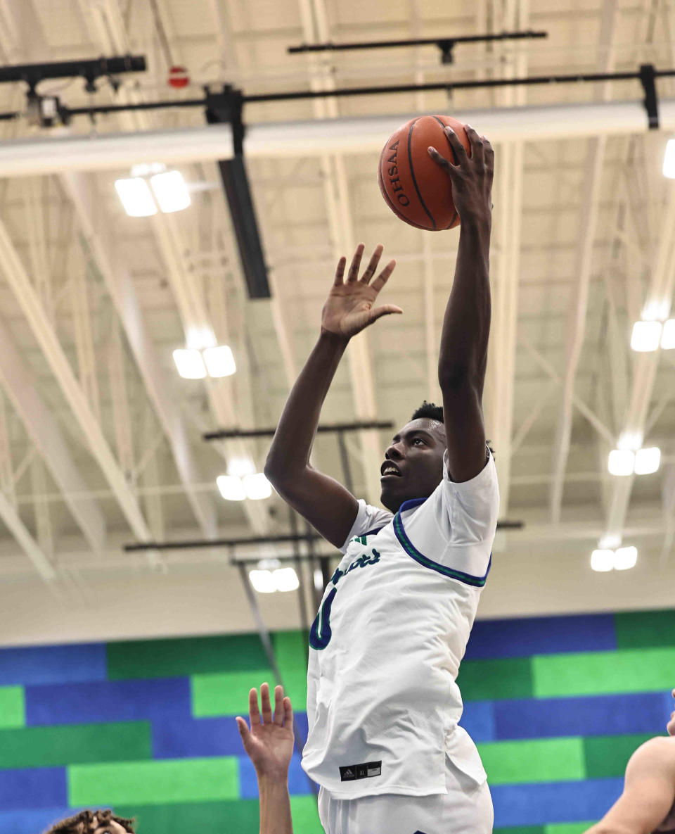 Winton Woods forward Tyler McKinley (0) scored 17 points to help the Warriors beat Anderson on Feb. 6 and win their first Eastern Cincinnati Conference championship.