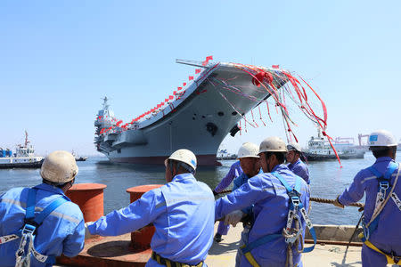 China's first domestically built aircraft carrier is seen during its launching ceremony in Dalian, China April 26, 2017. REUTERS/Stringer