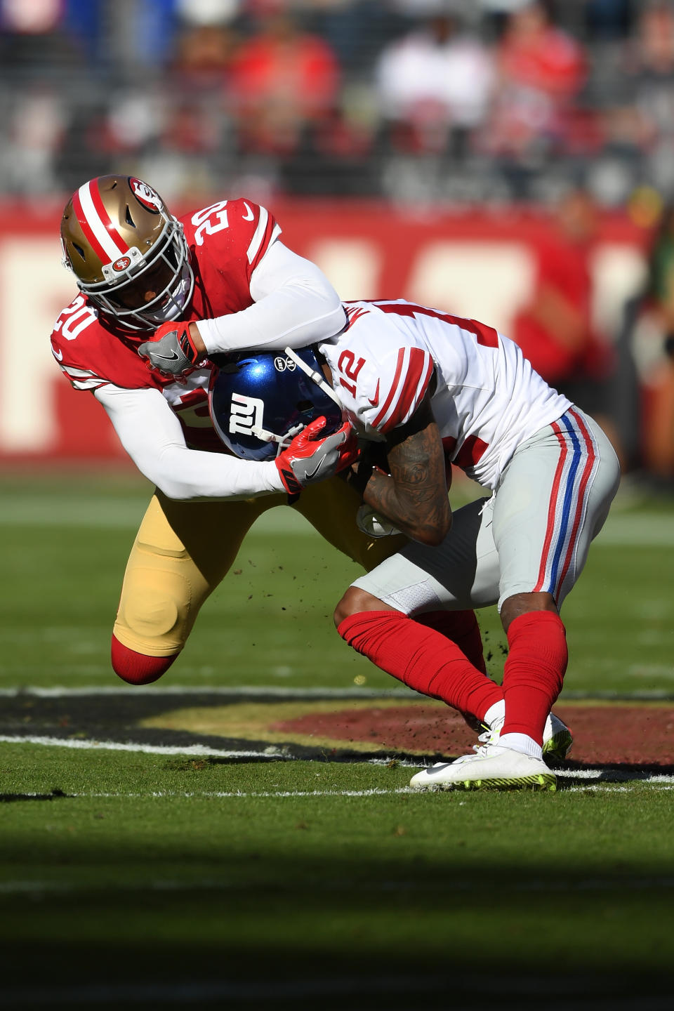 <p>Leon Hall #20 of the San Francisco 49ers tackles Tavarres King #12 of the New York Giants during their NFL game at Levi’s Stadium on November 12, 2017 in Santa Clara, California. (Photo by Thearon W. Henderson/Getty Images) </p>