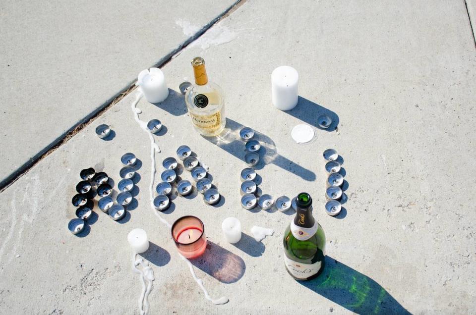 Candles spell out “NALI” in memory of Denali Anderson, the 20-year-old Kennewick man who was shot dead at a Saturday night party in the 6100 block of Pimlico Drive in Pasco, WA.