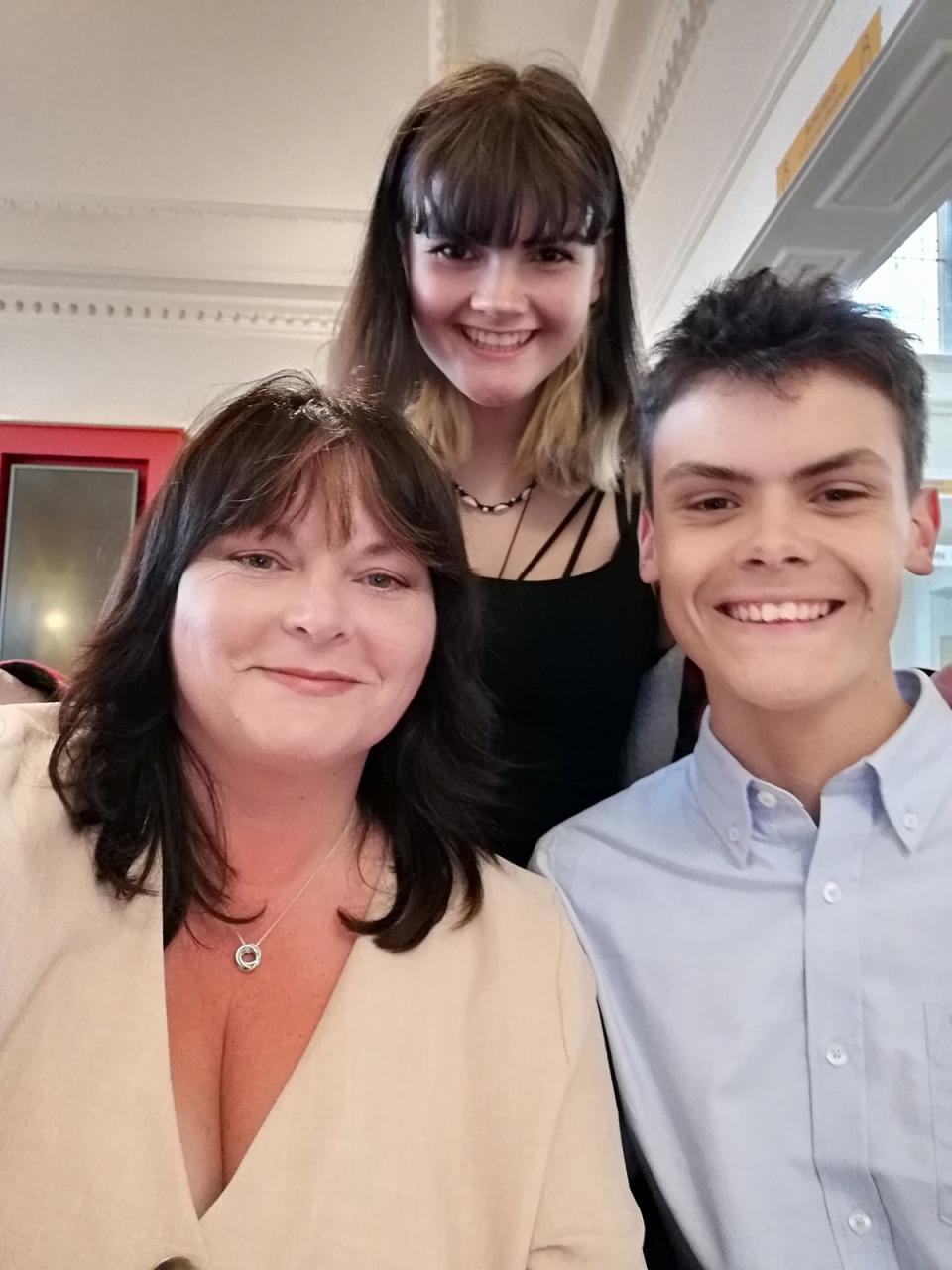 Lisa Stannard  and her two children Holly and Will. (Irwin Mitchell / SWNS)