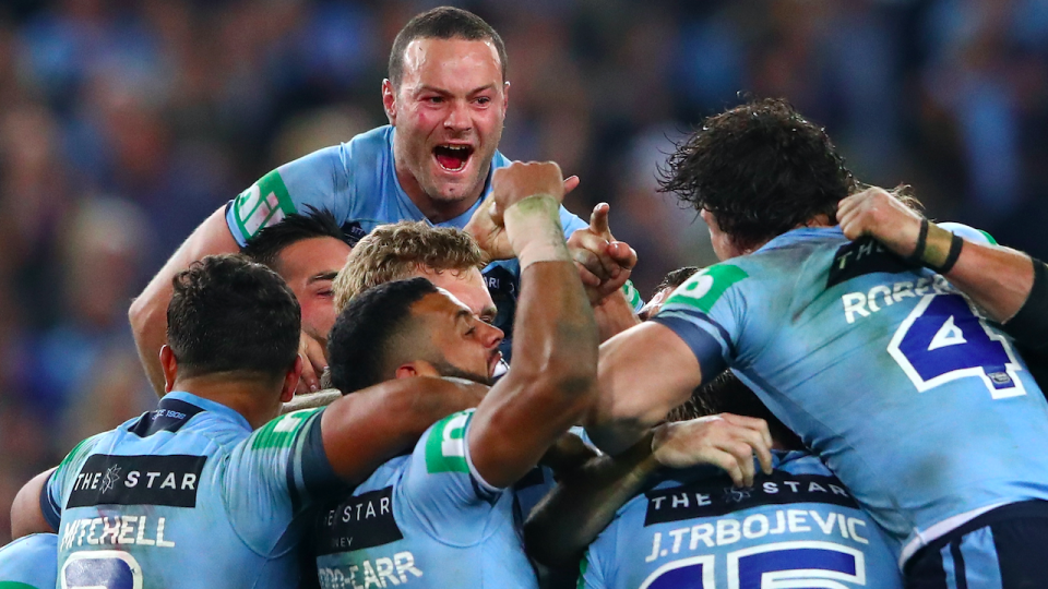 Cordner celebrates the Blues’ win with his teammates. Pic: Getty