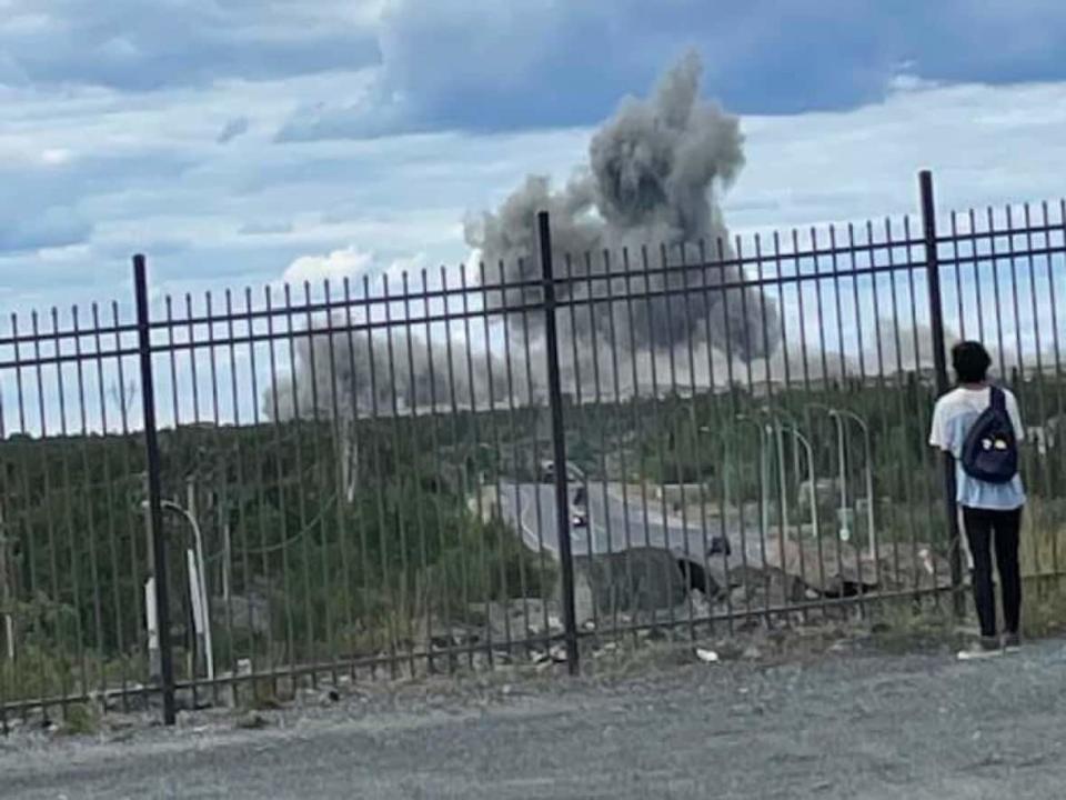 Dennis Nelner said he snapped this photo of the plume, looking north toward the city's dump, from the parking lot of the Explorer Hotel.  (Dennis Nelner/Facebook - image credit)