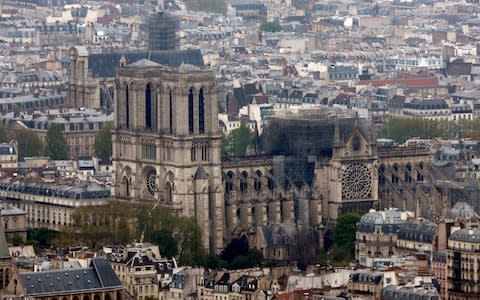 Authorities are reportedly speaking to engineers who recently started work on the Notre-Dame spire - Credit: Thibault Camus/AP