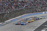 Drivers get the green flag for the start of the NASCAR Cup Series All-Star auto race at Texas Motor Speedway in Fort Worth, Texas, Sunday, June 13, 2021. (AP Photo/Larry Papke)