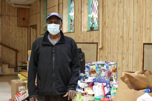 Alfred Dear, president of the St. Vincent and the Grenadines Association of Montreal, says he's proud to see people help leading up to the fundraiser.  (Matt D'Amours/CBC Montreal - image credit)