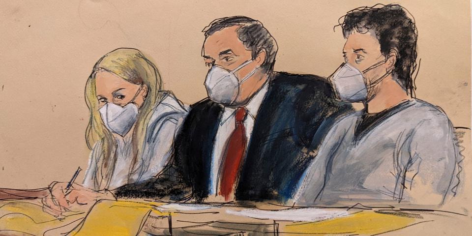 A courtroom sketch of a man in a suit, and two suspects at a table with masks on.