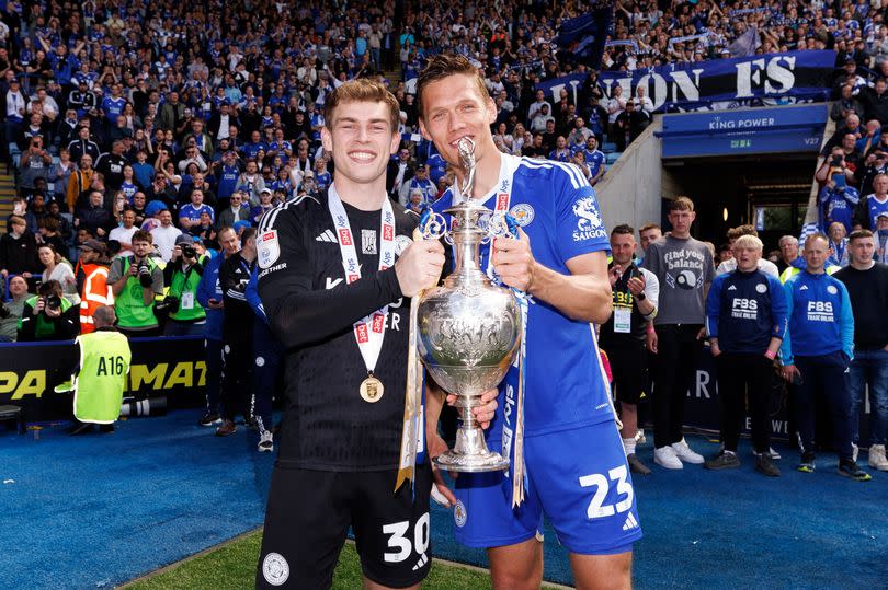 Mads Hermansen and Jannik Vestergaard celebrate with the Championship trophy