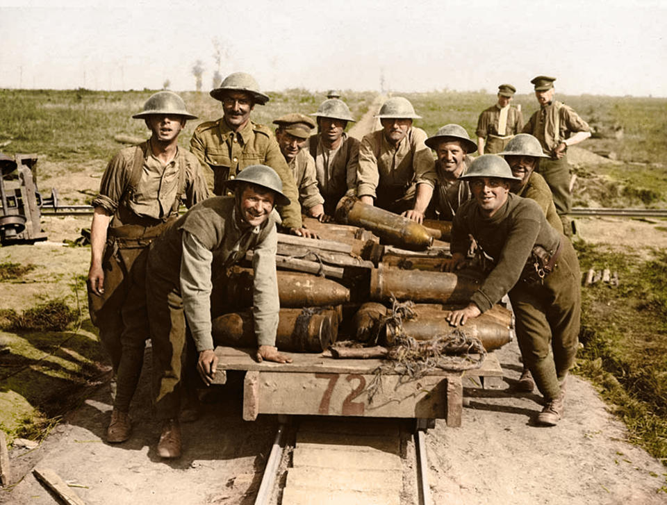 <p>Royal Garrison Artillery gunners pushing a light railway truck filled with shells, behind Zillebeke, Belgium, in October 1917. (Tom Marshall/mediadrumworld.com) </p>