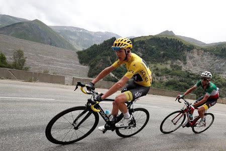 Cycling - The 104th Tour de France cycling race - The 183-km Stage 17 from La Mure to Serre-Chevalier, France - July 19, 2017 - Team Sky rider and yellow jersey Chris Froome of Britain and Astana rider Fabio Aru of Italy in action. REUTERS/Benoit Tessier