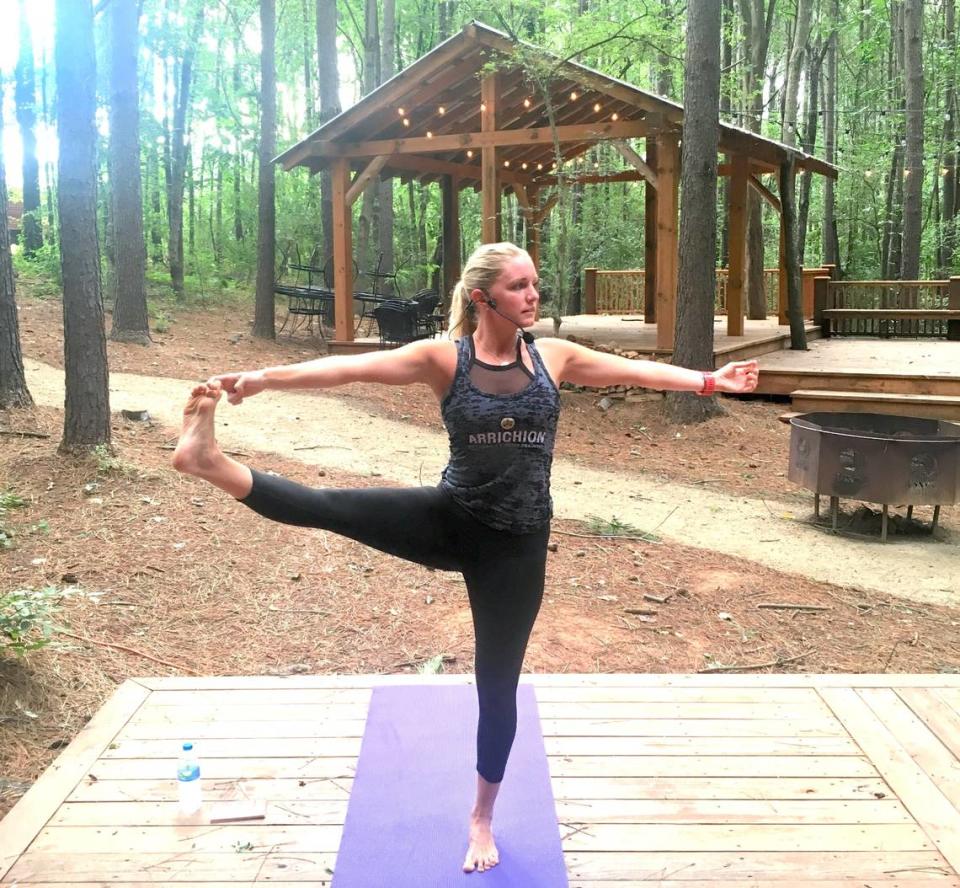 In this file photo, Quinn Burton of Arrichion Hot Yoga teaches a yoga class at the U.S. National Whitewater Center.