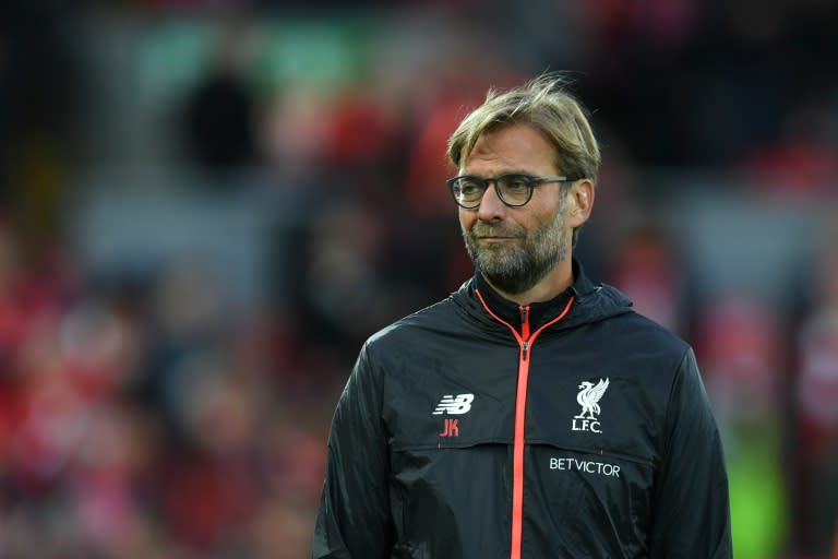 Liverpool's manager Jurgen Klopp stands on the pitch during the warm up ahead of the English Premier League football match between Liverpool and West Bromwich Albion at Anfield in Liverpool, north west England on October 22, 2016