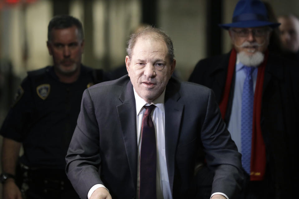 FILE - In this Feb. 20, 2020 file photo, Harvey Weinstein arrives at a Manhattan courthouse for his rape trial in New York. Weinstein was sentenced Wednesday, March 11, to 23 years in prison for rape and sexual assault. (AP Photo/Seth Wenig, File)