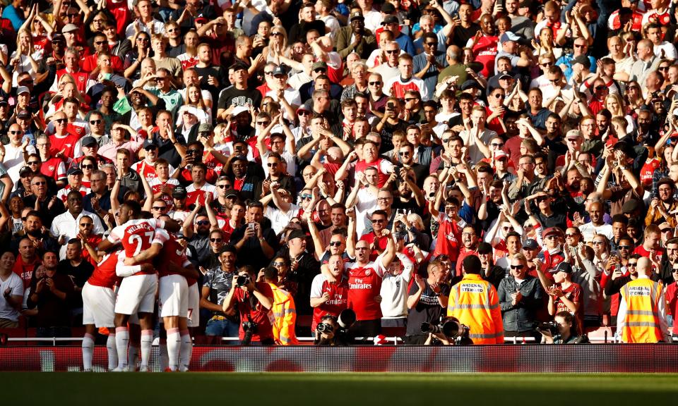 Arsenal fans celebrate Watford’s own goal in September.