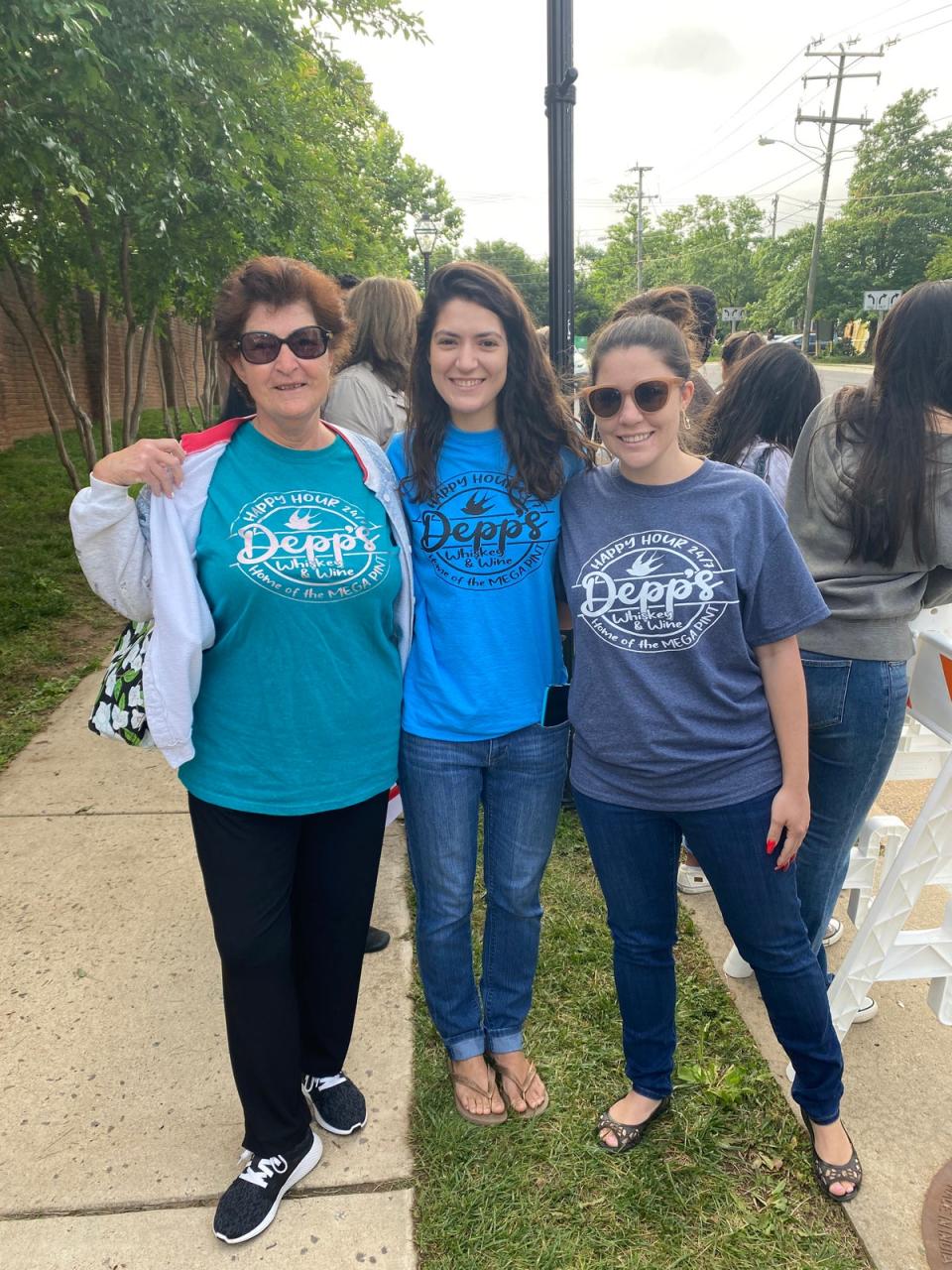 Camille and her daughters Britney and Ashley wear t-shirts with quotes from Johnny Depp’s now-in famous testimony (The Independent)