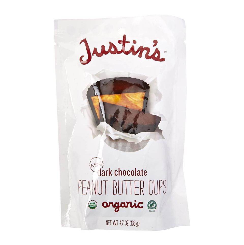 <p><strong>Justin's Nut Butter</strong></p><p>amazon.com</p><p><strong>$3.59</strong></p><p><a href="https://www.amazon.com/dp/B012H9HGSU?tag=syn-yahoo-20&ascsubtag=%5Bartid%7C2141.g.34414052%5Bsrc%7Cyahoo-us" rel="nofollow noopener" target="_blank" data-ylk="slk:Shop Now;elm:context_link;itc:0;sec:content-canvas" class="link ">Shop Now</a></p><p>Going dairy-free but still craving Reese's? Split the difference with these vegan <a href="https://www.prevention.com/food-nutrition/a32909155/tiktok-peanut-butter-hack/" rel="nofollow noopener" target="_blank" data-ylk="slk:peanut butter;elm:context_link;itc:0;sec:content-canvas" class="link ">peanut butter</a> cups. They're not individually wrapped, so they're best to save for yourself.</p>
