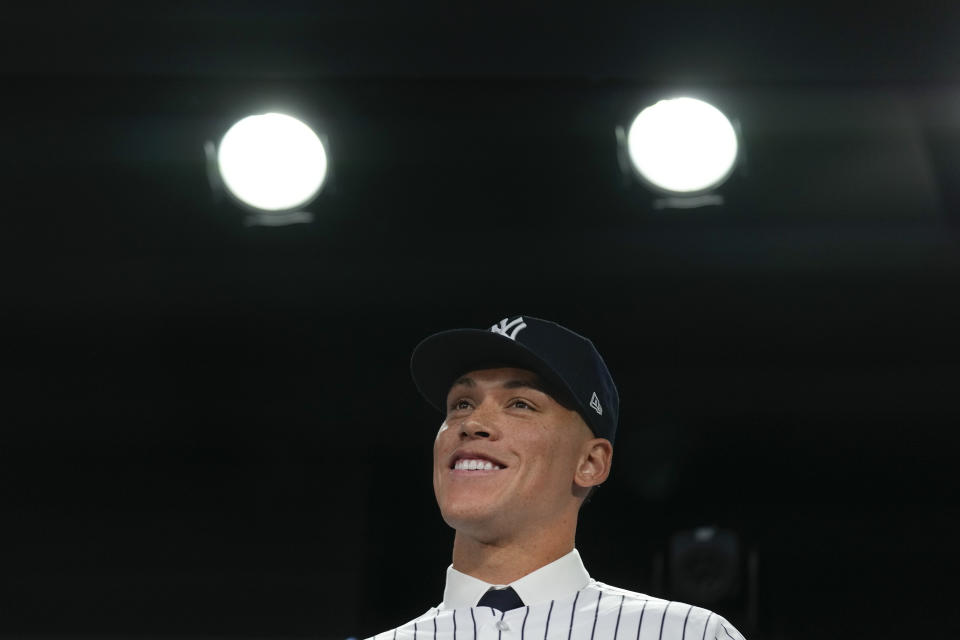 New York Yankees' Aaron Judge participates in a news conference at Yankee Stadium, Wednesday, Dec. 21, 2022, in New York. Judge has been appointed captain of the New York Yankees after agreeing to a $360 million, nine-year contract to remain in pinstripes. (AP Photo/Seth Wenig)