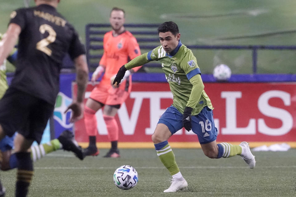 Seattle Sounders midfielder Alex Roldan (16) dribbles against Los Angeles FC during the first half of an MLS playoff soccer match, Tuesday, Nov. 24, 2020, in Seattle. (AP Photo/Ted S. Warren)