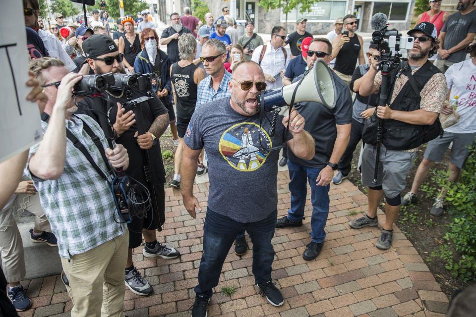 Info Wars founder Alex Jones joins nearly 150 anti-mask protesters.