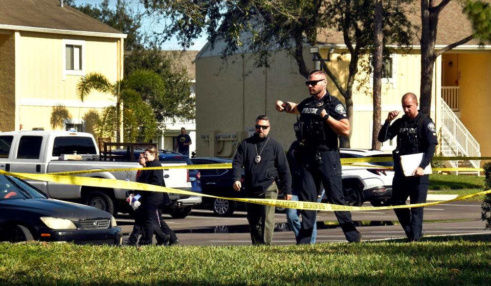 Palm Bay Police on Sunday at Woodlake Village, at the scene where three people were shot dead and two wounded in an apartment complex. See the story by J.D. gallop for more information,