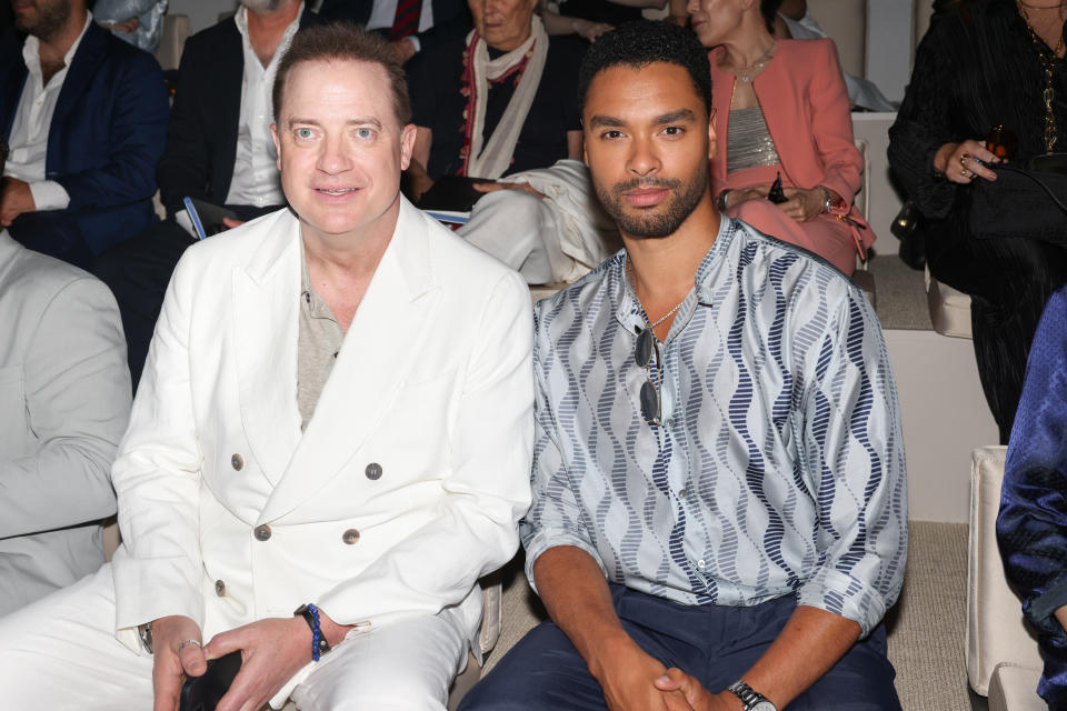MILAN, ITALY - JUNE 19: (L-R) Brendan James Fraser and Regé-Jean Page is seen on the front row at the Giorgio Armani Spring/Summer 2024 fashion show during the Milan Fashion Week menswear spring/summer 2024 on June 19, 2023 in Milan, Italy. (Photo by Pietro D'Aprano/Getty Images)