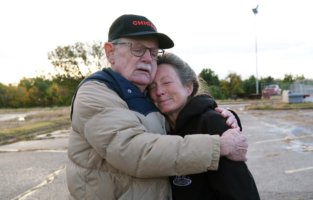 Chuck Tweed, the driving force behind Jewel Box Theatre, hugs Shawna Linck on Tuesday, Oct. 25, 2022, as the building that used to be home to Jewel Box was demolished.