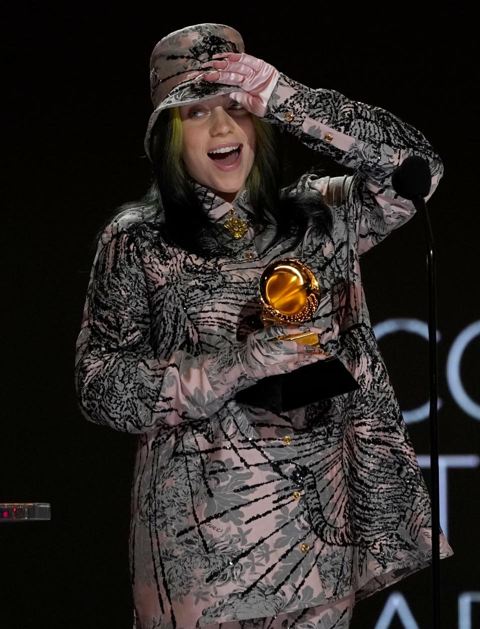Billie Eilish reacts as she accepts the award for record of the year for "Everything I Wanted" at the 63rd annual Grammy Awards.