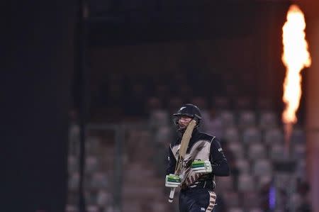 Cricket - England v New Zealand - World Twenty20 cricket tournament semi-final - New Delhi, India - 30/03/2016. New Zealand's Martin Guptill walks off the field after his dismissal. REUTERS/Adnan Abidi