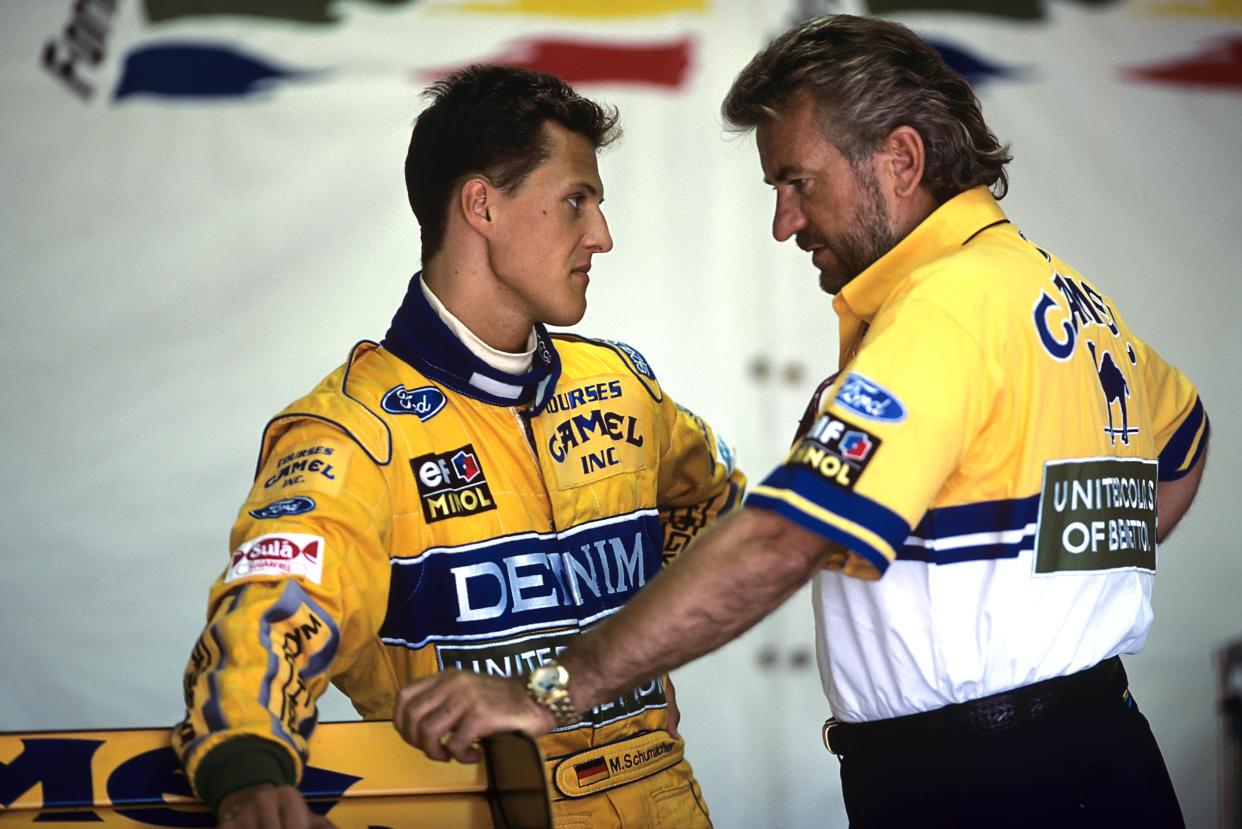 Michael Schumacher, Willy Weber, Grand Prix of Great Britain, Silverstone, 11 July 1993. Michael Schumacher discussing with manager Willy Weber. (Photo by Paul-Henri Cahier/Getty Images)