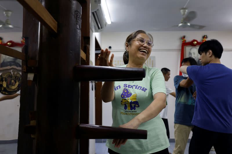 The Wider Image: Fifty years on, Bruce Lee's legacy squares up to modern life in Hong Kong