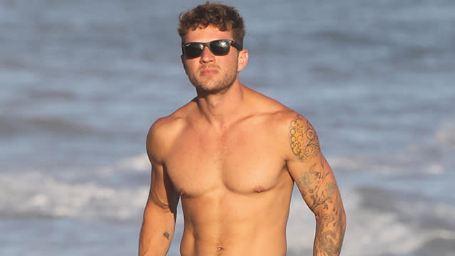 Ryan Phillippe is obviously aging quite nicely. The <em> Cruel Intentions </em>actor and dad-of-three showed off his super-fit physique on the beach in Malibu, California on Sunday, going shirtless. He's 40?! <strong>PHOTOS: Hollywood's Sexiest Shirtless Men</strong> Splash News Phillippe was accompanied by his girlfriend, 24-year-old law student Paulina Slagter. The <em>MacGruber</em> star has talked about his age-defying looks in the past, telling <em> Variety</em> in March that people actually sometimes mistake him for the brother of his 15-year-old daughter, Ava Phillippe. "I get carded constantly," he admitted. "My daughter hates it, because sometimes people have thought I'm her brother, and she’s freaked out by that." Speaking of Ava, Phillippe also revealed to <em>Elle </em>in March that he has the same personality traits as his teenage daughter with his ex-wife, Reese Witherspoon. Specifically, he said the two share an intense sense of empathy. "You know, depression has been a huge obstacle for me ever since I was a child," Phillippe revealed. "As you get older I think it decreases some, but I'm just innately kind of a sad person. I'm empathetic, and I take on the feelings of others and transpose myself into the position of others. I see it in my daughter." <strong>WATCH: EXCLUSIVE '54' Clip -- Ryan Phillippe's Shirtless Boogie Restored in Director's Cut</strong> Watch below: