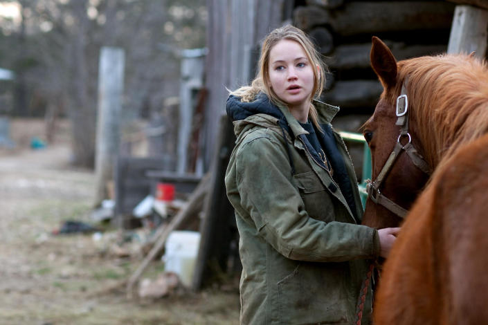 Jennifer Lawrence with a horse