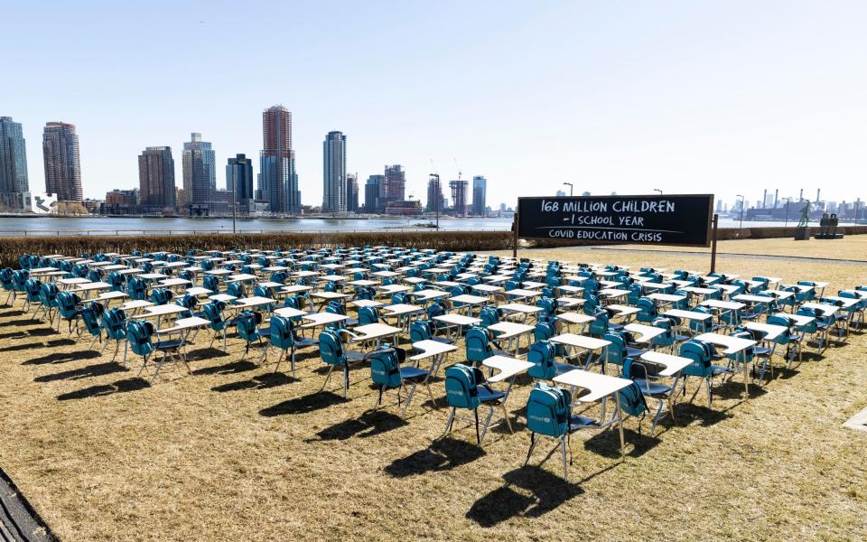 A grid of 168 desks makes up the UNICEF organized 'pandemic classroom' installation on the grounds of United Nations headquarters in New York - JUSTIN LANE/EPA-EFE/Shutterstock