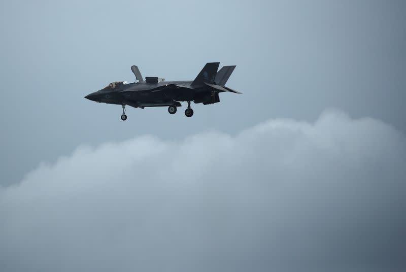 A U.S. Marine Corps F-35B Joint Strike Fighter hovers in an aerial display during a media preview of the Singapore Airshow in Singapore