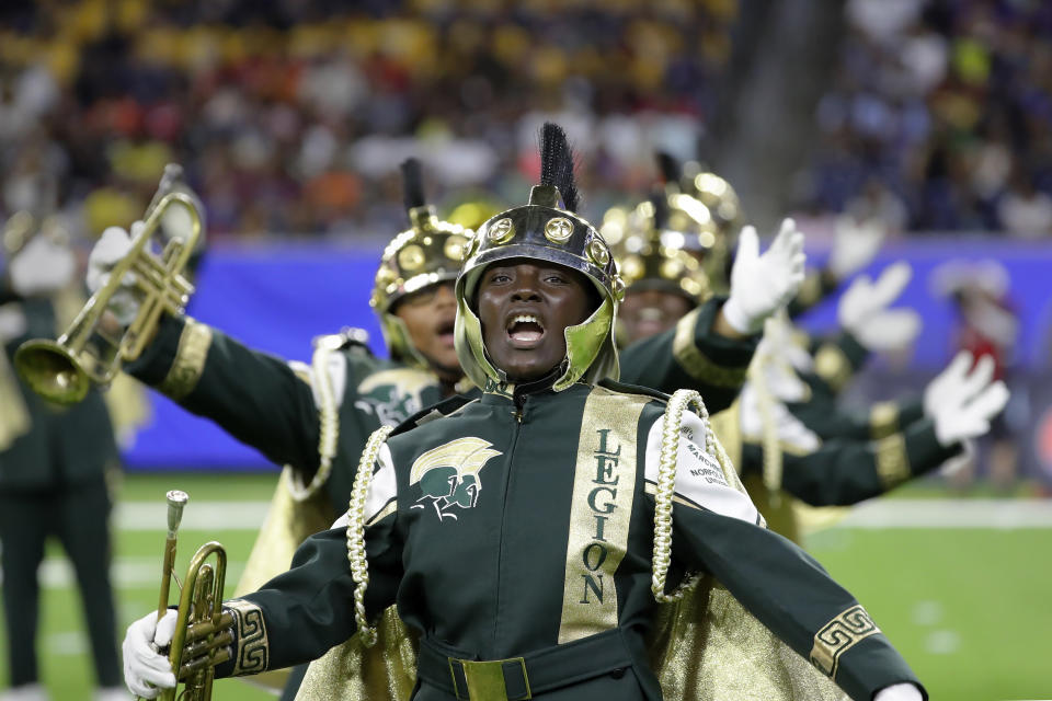 Members of the Norfolk State University Spartan Legion marching band perform during the 2023 National Battle of the Bands, a showcase for HBCU marching bands, held at NRG Stadium, Saturday, Aug. 26, 2023, in Houston. (AP Photo/Michael Wyke)