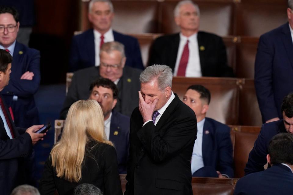 Kevin McCarthy speaking with Marjorie Taylor Greene as he lobbied to become Speaker (AP)