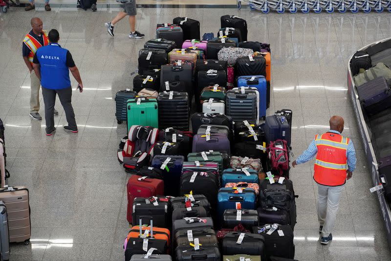 FILE PHOTO: Lines remain at airports after cyber outage, in Atlanta