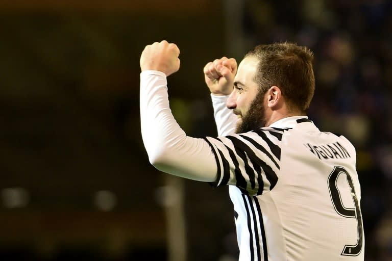 Juventus' forward Gonzalo Higuain celebrates after scoring a goal on February 12, 2017