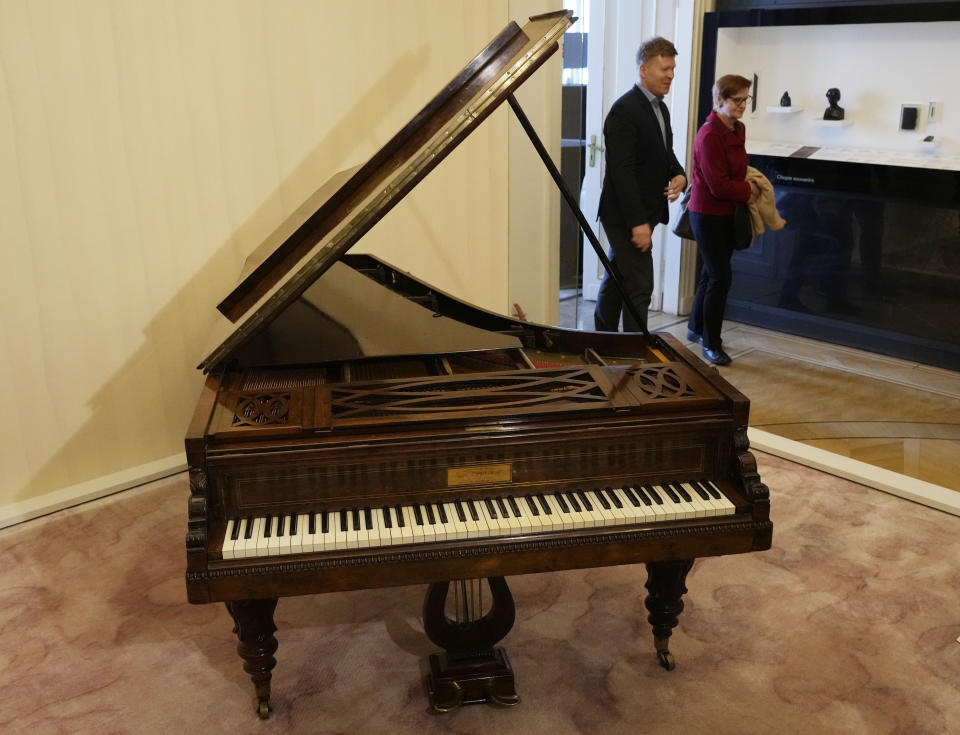 Frederic Chopin's last piano, a Pleyel, among the items on display at the refurbished museum of the Polish 19th century pianist and composer, which opens this week displaying also his handwritten letters, at the Frederic Chopin Museum in Warsaw, Poland, Thursday, April 27 2023. Popular among Poles and foreign tourists, the museum to Poland’s greatest 19th-century musician closed in the fall of 2022 for the renovation and rearrangement works. (AP Photo/Czarek Sokolowski)