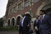 Gambia's attorney general Dawda Jallow comments outside the International Court of Justice in The Hague, Netherlands, Friday, July 22, 2022, where judges of the UN court dismissed Myanmar's preliminary objections, saying it has jurisdiction in Rohingya genocide case. (AP Photo/Peter Dejong)