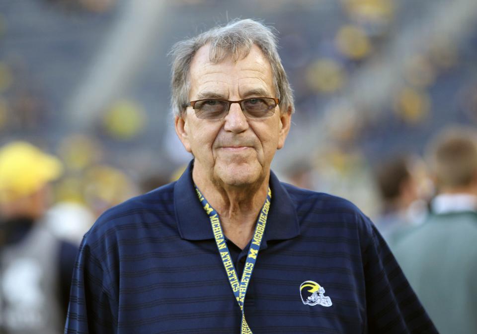 Former Michigan football coach Lloyd Carr stands on the field at Michigan Stadium prior to a game against Michigan State on Oct. 7, 2017 in Ann Arbor.