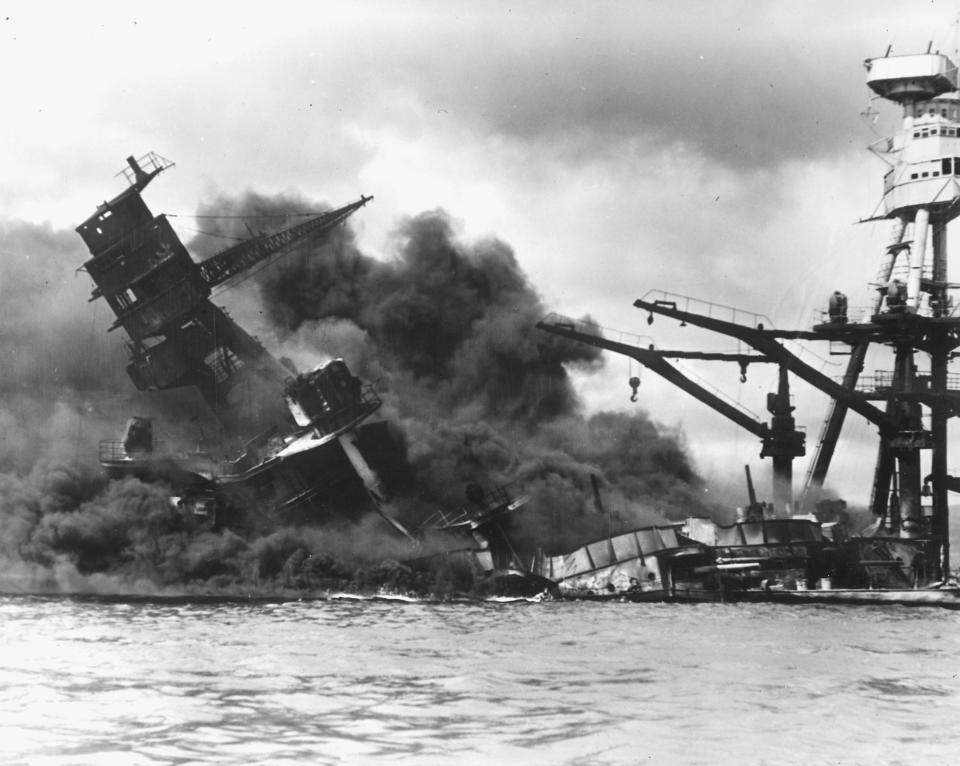 The battleship USS ARIZONA sinking after being hit by a Japanese air attack on Pearl Harbor, Hawaii, December 7, 1941. The U.S. National Archives/Handout via Reuters  ATTENTION EDITORS - THIS IMAGE WAS PROVIDED BY A THIRD PARTY. EDITORIAL USE ONLY