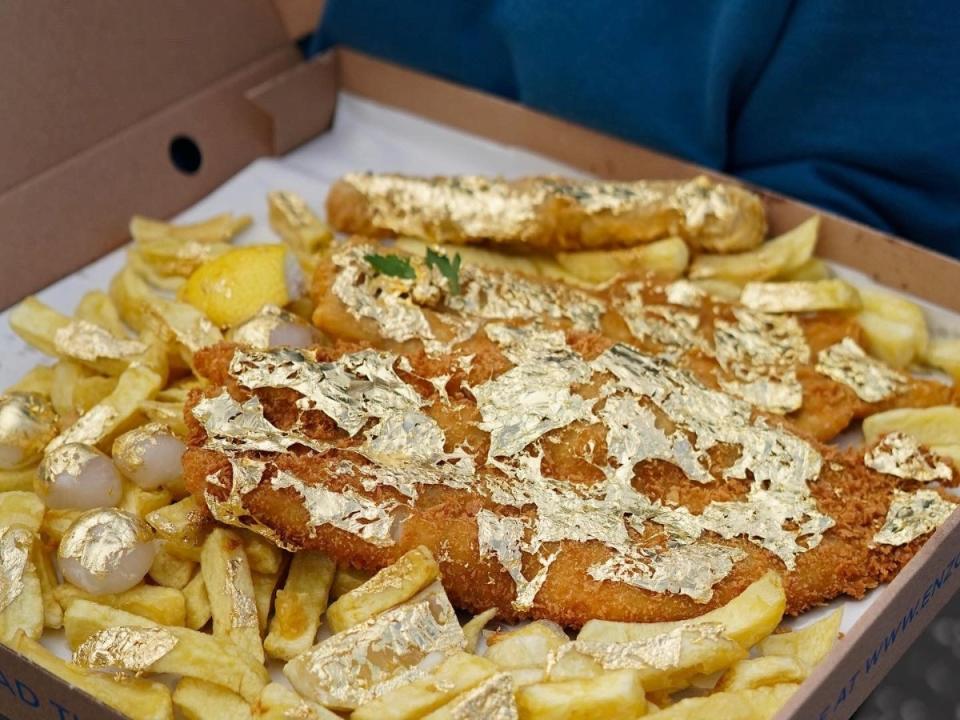 Enzo's takeaway in Glasgow has launched a fish supper coated in 24 karat gold. (swns)