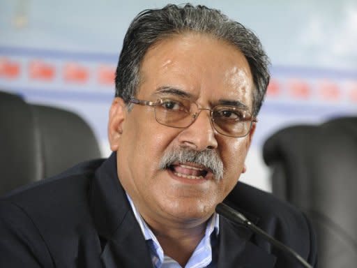 Maoist party chairman Pushpa Kamal Dahal, also known as Prachanda, addresses a 2011 press conference in Kathmandu. Prachanda has called for rival parties to join a national unity government to take the country to fresh elections and said he was open to a change of prime minister