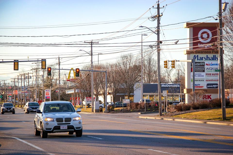 Cars drive along Route 6 near the RK Swansea Place plaza on Sunday, March 17, 2024. The area could be served by a new sewer system if paid for by voters at Annual Town Meeting.